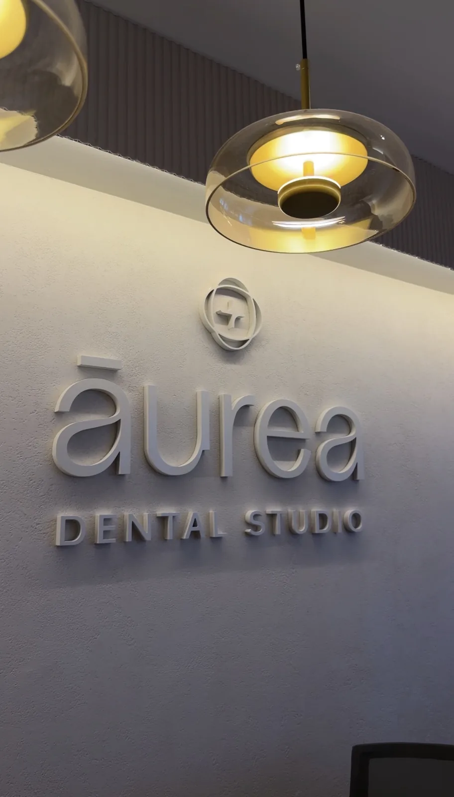 Aurea Dental Studio logo wall